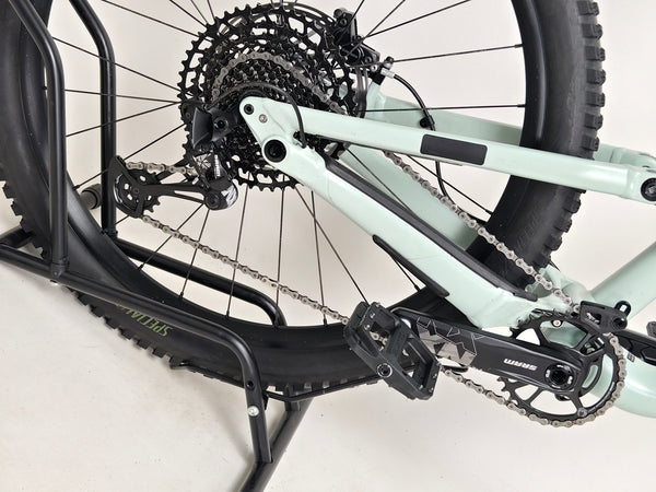 Specialized Status 160 in Very Good Condition at eMado Bikes - highlighting the bike's ride quality over rough terrain.