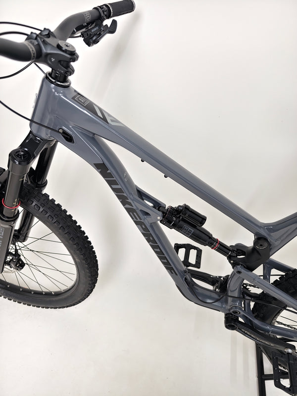 Nukeproof Mega 290 Alloy Comp 2023 focusing on the decal and branding in excellent used condition at eMado Bikes.