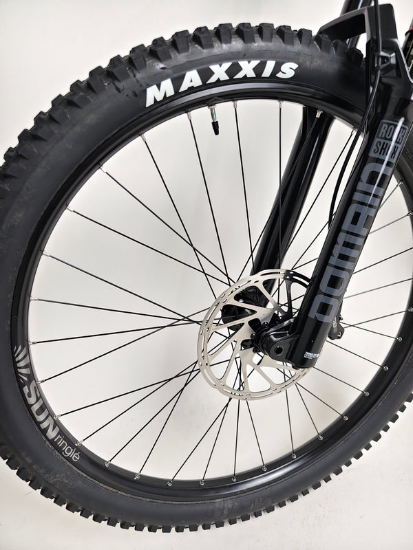 Nukeproof Mega 290 2023 close-up of the wheel detailing showcasing its excellent used condition at eMado Bikes.