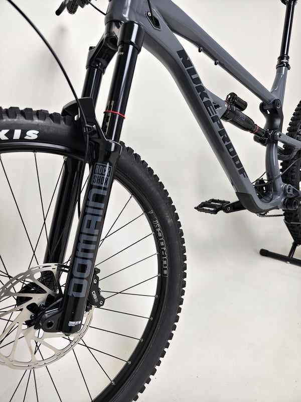 Ergon saddle on the Nukeproof Mega 290 Alloy Comp 2023 bike, featured in excellent used condition at eMado Bikes.