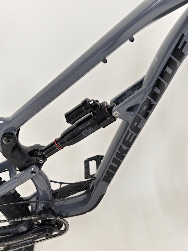 Snapshot of Nukeproof Mega 290 Alloy Comp 2023 across different angles demonstrating excellent used condition at eMado Bikes.