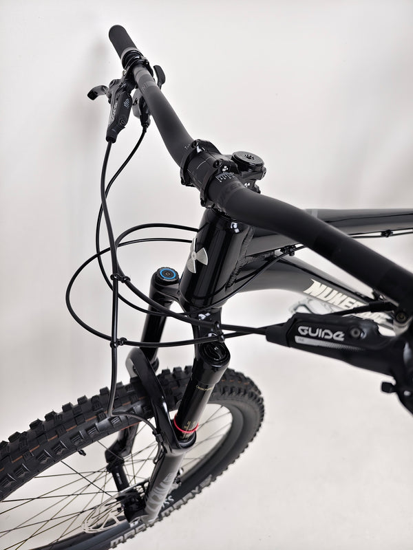 A close-up view of the Nukeproof Scout 275 RS 2023 in excellent used condition, focusing on the SRAM GX Eagle logo.