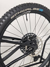 Environmental shot of Nukeproof Scout 275 RS 2023 in excellent used condition, ideal for outdoor settings.