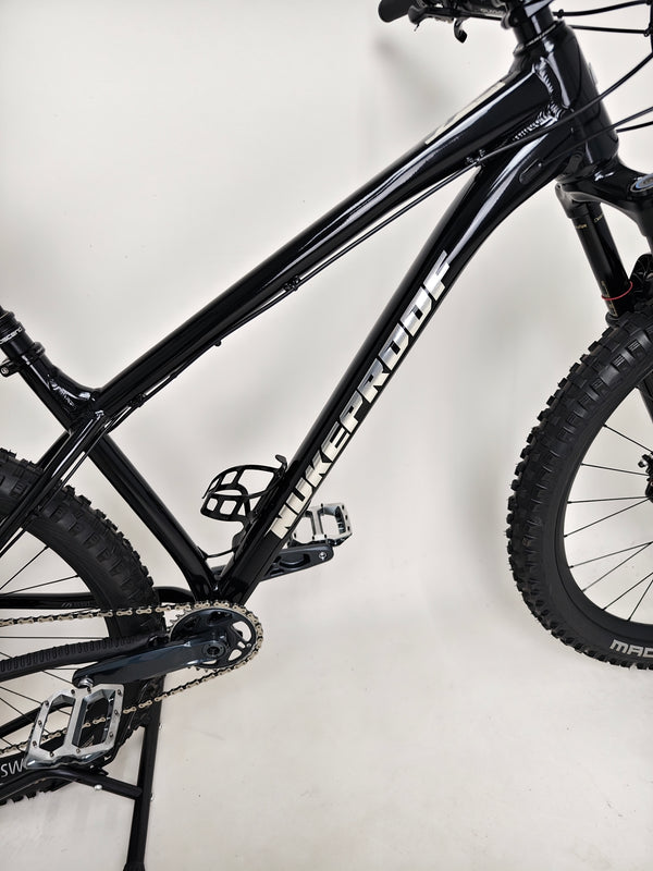 Top view of Nukeproof Scout 275 RS 2023 in excellent used condition, demonstrating its full-fledged design layout.