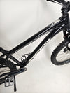 A stylized shot of Nukeproof Scout 275 RS 2023 in excellent used condition, ideal for mountain biking enthusiasts.