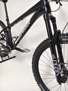 Rear view of the Nukeproof Scout 275 RS 2023 in excellent used condition, showcasing its sleek lines and design.
