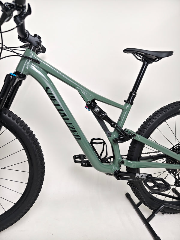 Rear brake view of the used Specialized Stumpjumper Comp Alloy mountain bike to show its high-end parts.