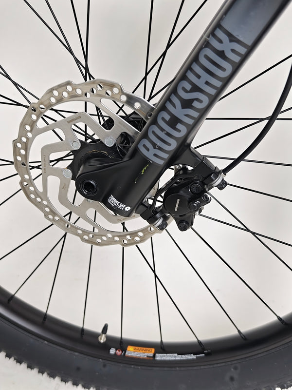 2023 Cannondale CUJO 2 mountain bike positioned in a scenic outdoor setting.