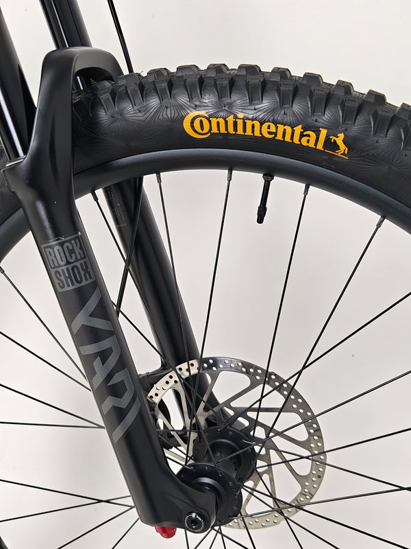 Trek Fuel EX 7 2024 Gen 6 (upgraded), M-L in Very Good Condition - demonstrating the bike's suspension in action.