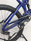 Trek Fuel EX 7 2024 Gen 6 (upgraded), M-L in Very Good Condition - capturing the agility of the bike in a turn.