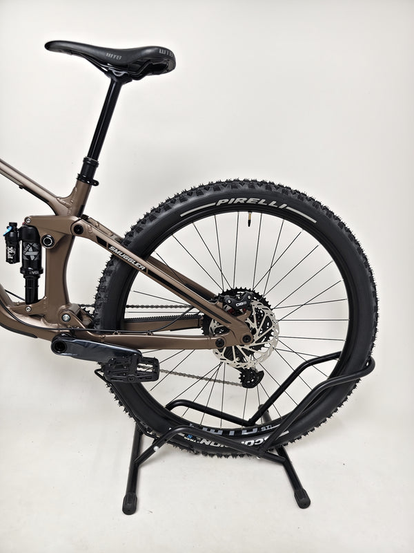 View of the rear derailleur on the Transition Smuggler NX 2024 in medium, showcasing its cutting-edge design.