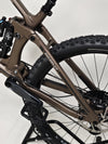 Detailed view of the cranks and gears on the Transition Smuggler NX 2024 in medium, showcasing its performance gear.