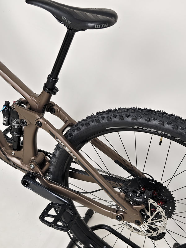 The Transition Smuggler NX 2024 in medium, elegantly posed for photography showcasing its features.