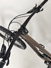 The Transition Smuggler NX 2024 in medium, expertly painted in espresso and shining under natural light.