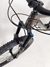 View focusing on wheel details of the Transition Smuggler NX 2024 in medium, featuring WTB STi30 rims.