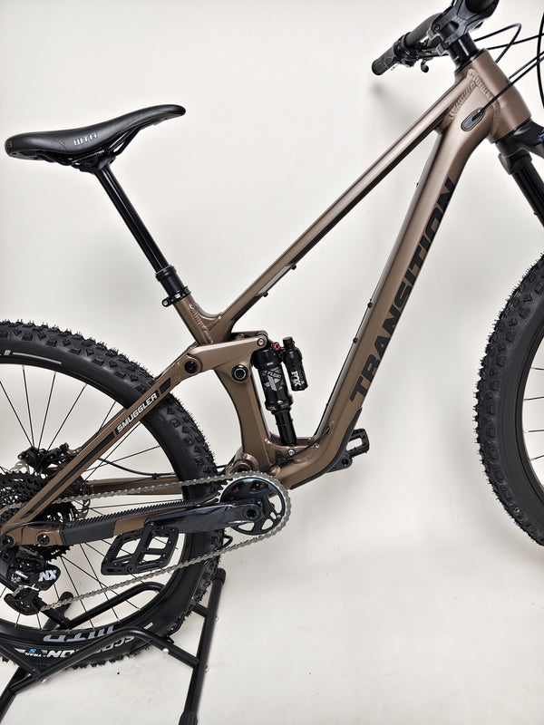 Side view of the Transition Smuggler NX 2024 in medium, emphasizing its ergonomic design and build.