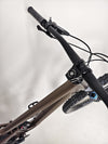 Angle showcasing the frame and suspension system of the Transition Smuggler NX 2024 in medium, emphasizing durability.