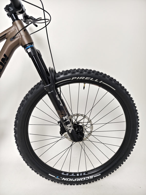 Image showcasing the rear wheel of the Transition Smuggler NX 2024 in medium, highlighting performance tubes.