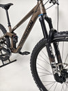 Action shot of the Transition Smuggler NX 2024 in medium, perfect for mountain biking adventures.