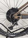 The Transition Smuggler NX 2024 in medium contrasted against natural landscapes, suitable for biking.