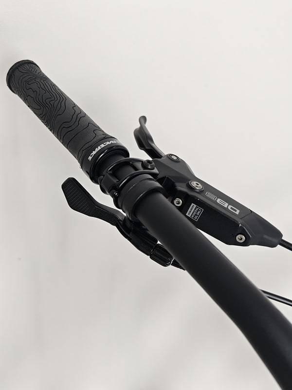 Angle showcasing SRAM components on the Transition Smuggler NX 2024 in medium for mountain biking.