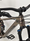 The Transition Smuggler NX 2024 in medium parked on the trails, illustrating its suitability for mountain biking.