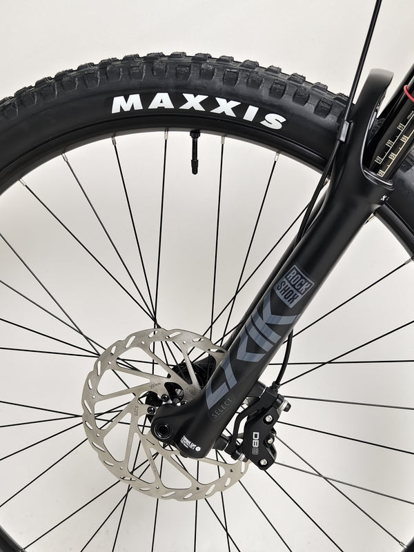 Nukeproof Mega 290 CARBON - Highlighting the bike's rear suspension performance.