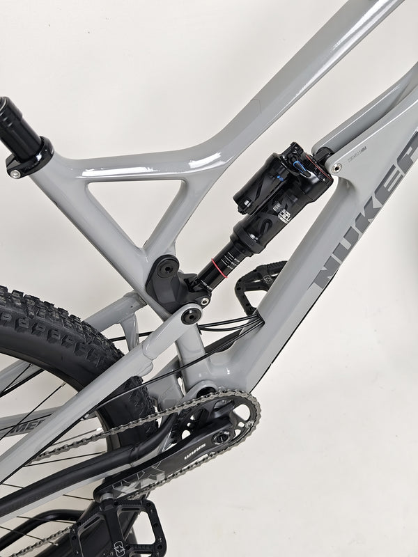 Nukeproof Mega 290 CARBON - Close-up of the RockShox Super Deluxe Ultimate RCT shock unit.