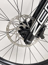 Dynamic trail action shot with the Orange ALPINE 6 Full Suspension Mountain Bike.