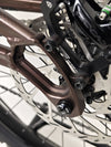 The Orange ALPINE 6 mountain bike showcasing its impressive features in a cycling event.