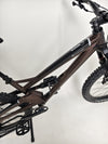 Detailed view of the Orange ALPINE 6 mountain bike's graphics and branding.