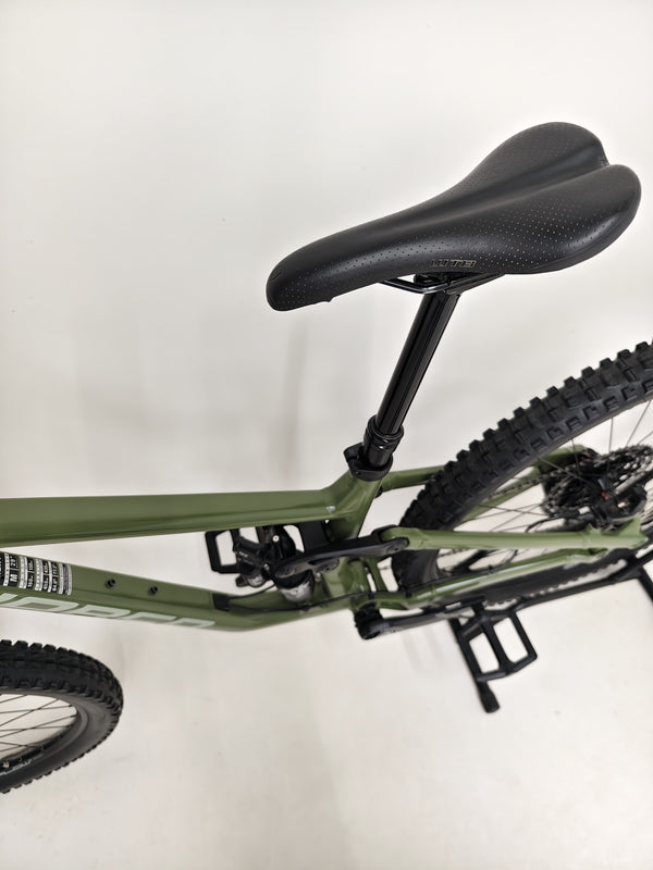 Thrilling action shot of the Norco Sight A2 2021 mountain bike on a rugged trail.