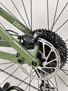 Norco Sight A2 2021 in focus against a blurred background, capturing the bike's details.