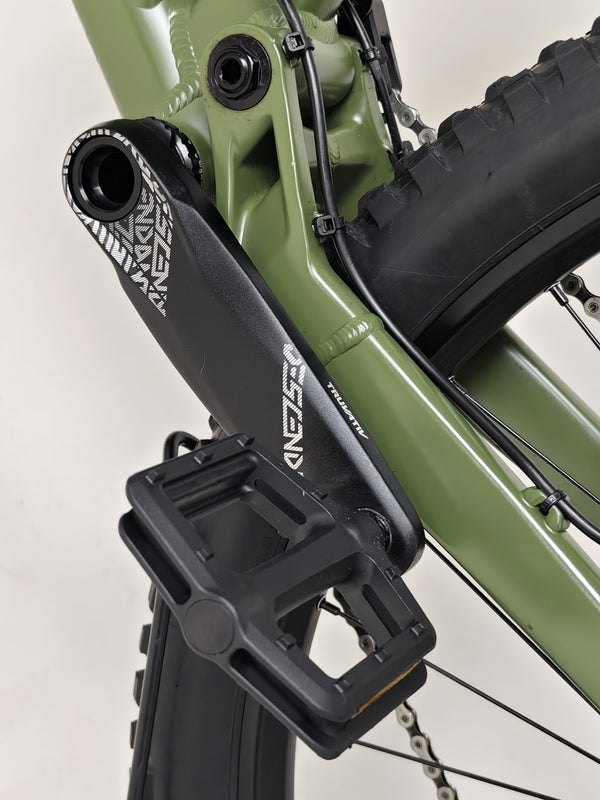 Rider using the Norco Sight A2 2021 mountain bike during a challenging uphill climb.