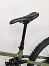 Side view of the Norco Sight A2 2021 mountain bike in a showroom setting, reflecting its condition.