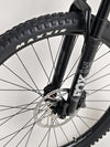 Norco Sight A2 2021 mountain bike parked under a tree, highlighting outdoor durability.