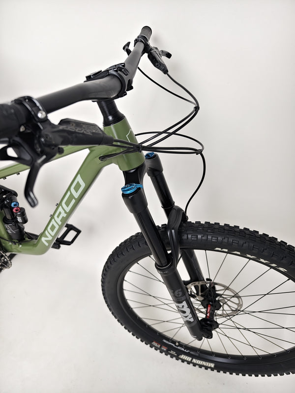 Norco Sight A2 2021 in action on a steep downhill with rider showcasing agility.