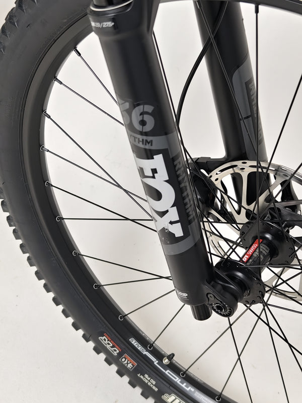 The Norco Sight A2 2021 shown on a rocky trail, emphasizing its enduro characteristics.