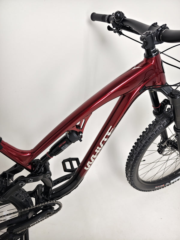 Victory moment of the Whyte T-160 S 2025 hitting a jump on an adventurous trail.