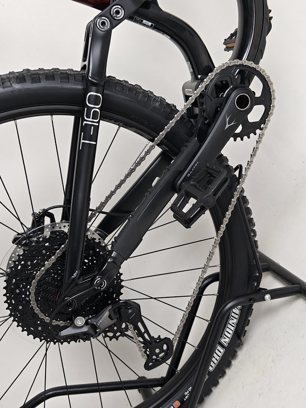 Whyte T-160 S 2025 shown on a dynamic outdoor landscape, perfect for trail conquering adventures.