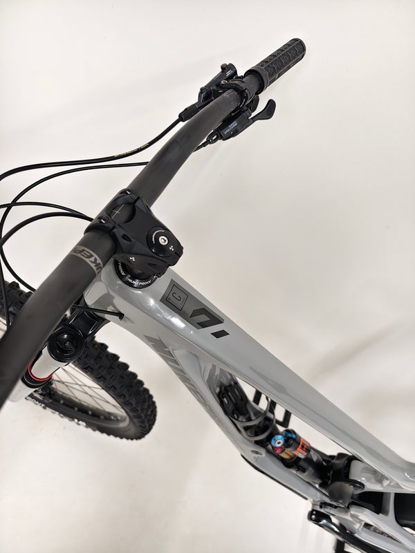 Nukeproof Giga 290 Comp Carbon 2022 bike showcasing the handlebars and cockpit setup.