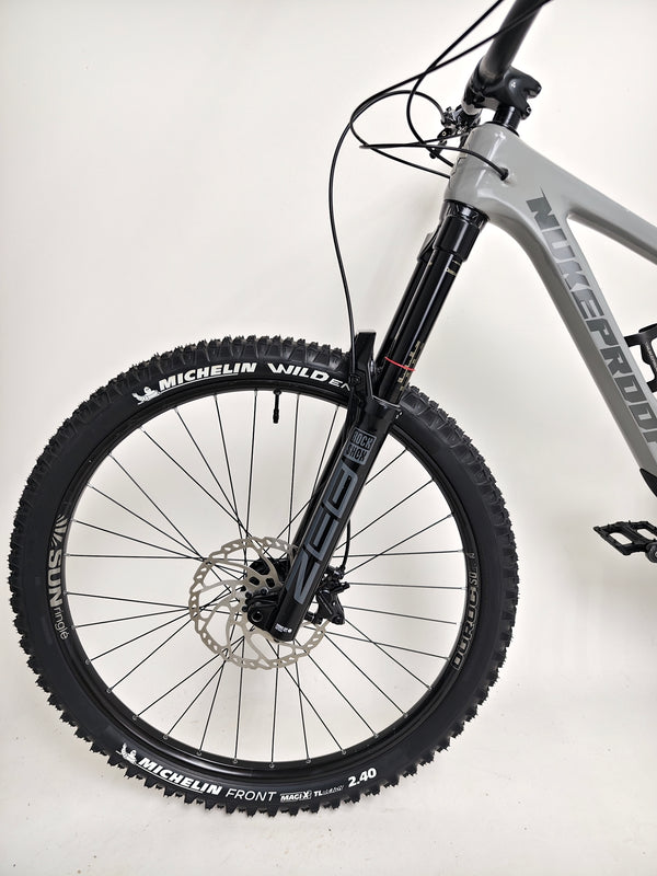 Nukeproof Giga 290 Comp Carbon 2022 bike demonstrating excellent grip on terrain.