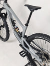 Nukeproof Giga 290 Comp Carbon 2022 mountain bike parked in a scenic outdoor area.