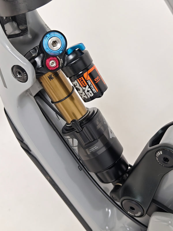 Nukeproof Giga 290 Comp Carbon 2022 captured in action on a mountain slope.