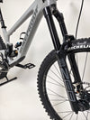Full frontal view of the Nukeproof Giga 290 Comp Carbon 2022 mountain bike under natural light.