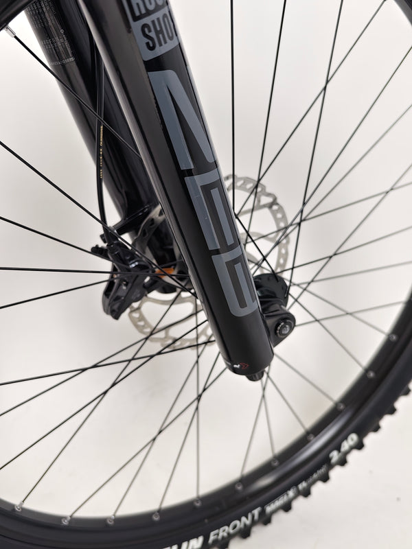 Nukeproof Giga 290 Comp Carbon 2022 bike parked showing full side profile.