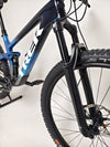 Trek Top Fuel 9.7 2022 CARBON mountain bike with a focus on its tubeless wheelset, designed for optimal performance.