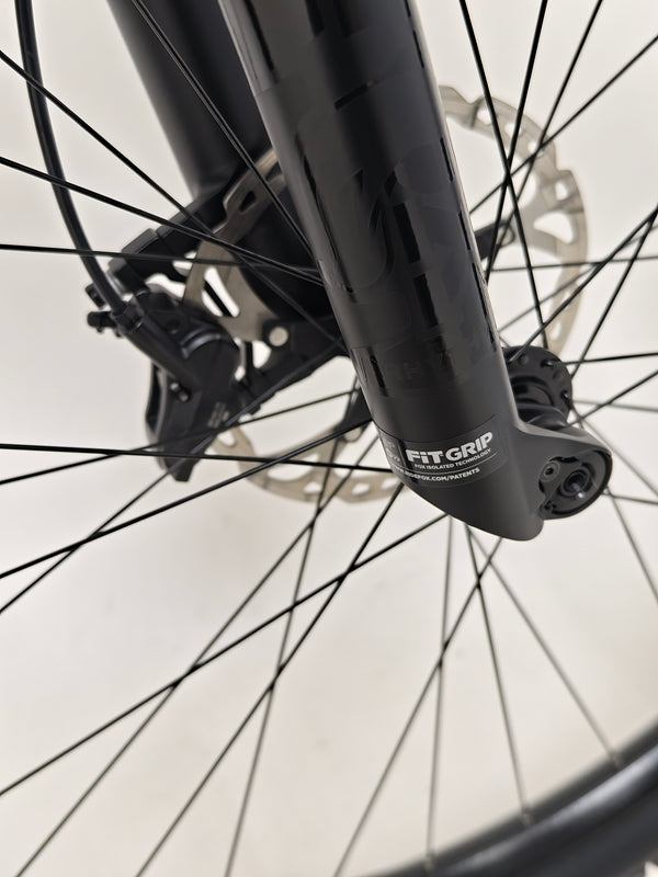 Trek Top Fuel 9.7 frame details highlighted to show carbon weave and design.