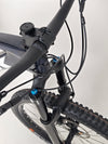 Trek Top Fuel 9.7 2022 CARBON mountain bike parked off-road ready for adventure.