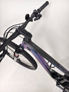 Handlebar view of the Scott Spark RC 900 Team Issue AXS Carbon featuring the TwinLoc remote.